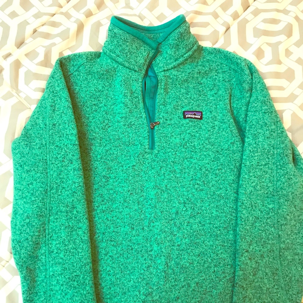 Women’s size Medium Patagonia half zip sweater.